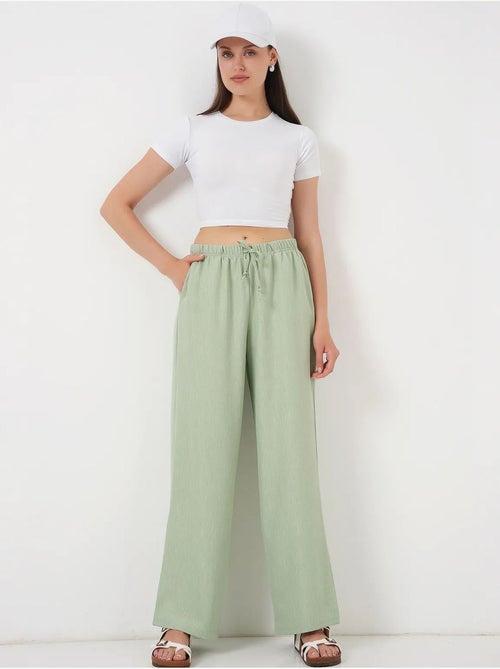 Relaxed broek met wijde pijpen en trekkoord bdart - Kiabi Relaxed broek met wijde pijpen en trekkoord bdart - Kiabi