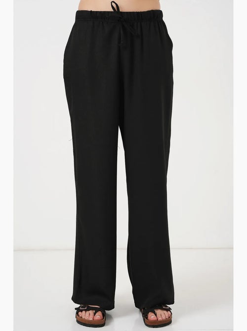 Relaxed broek met wijde pijpen en trekkoord bdart - Kiabi Relaxed broek met wijde pijpen en trekkoord bdart - Kiabi