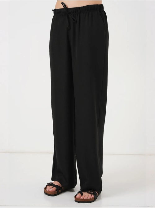 Relaxed broek met wijde pijpen en trekkoord bdart - Kiabi Relaxed broek met wijde pijpen en trekkoord bdart - Kiabi