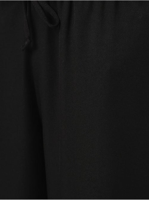 Relaxed broek met wijde pijpen en trekkoord bdart - Kiabi Relaxed broek met wijde pijpen en trekkoord bdart - Kiabi