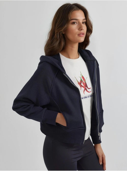 Relaxed fit hoodie met rits hiccup - Kiabi Relaxed fit hoodie met rits hiccup - Kiabi