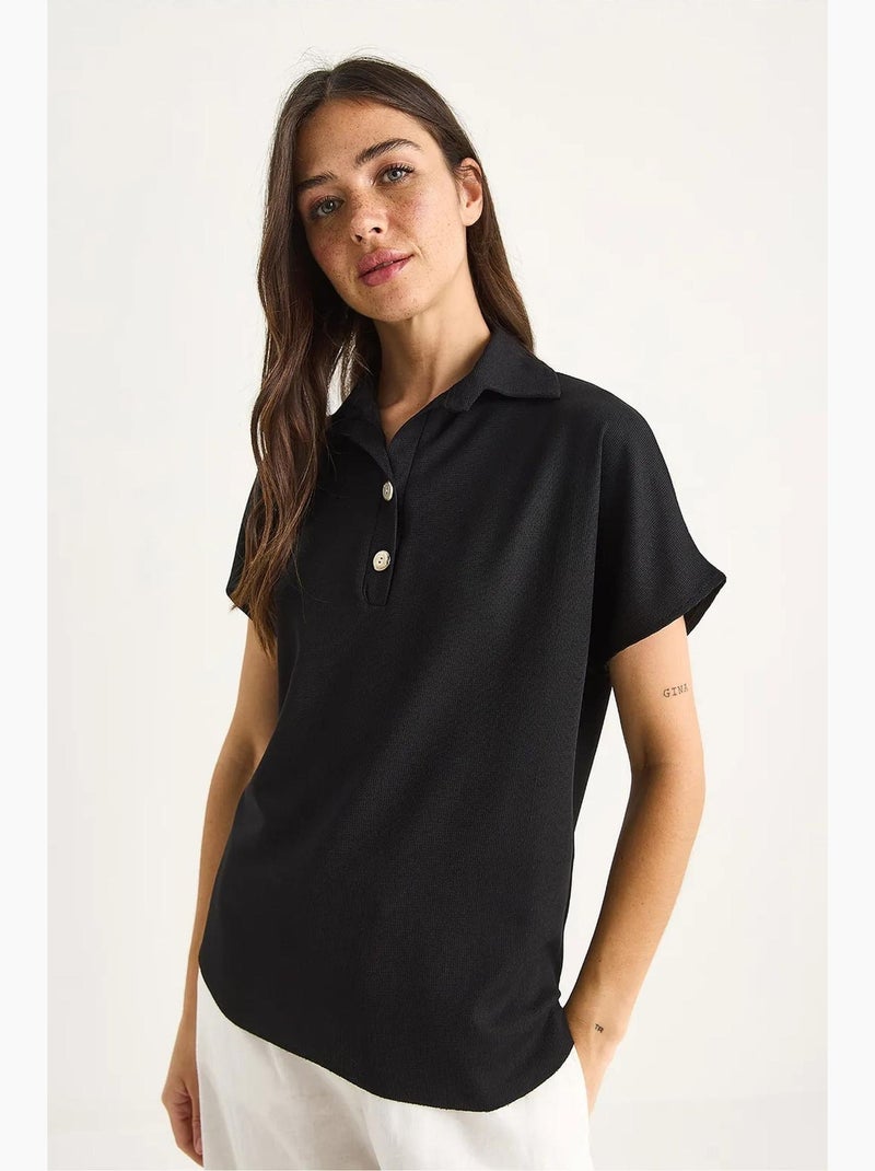 Relaxed fit polo-t-shirt met knopen lucci Zwart - Kiabi