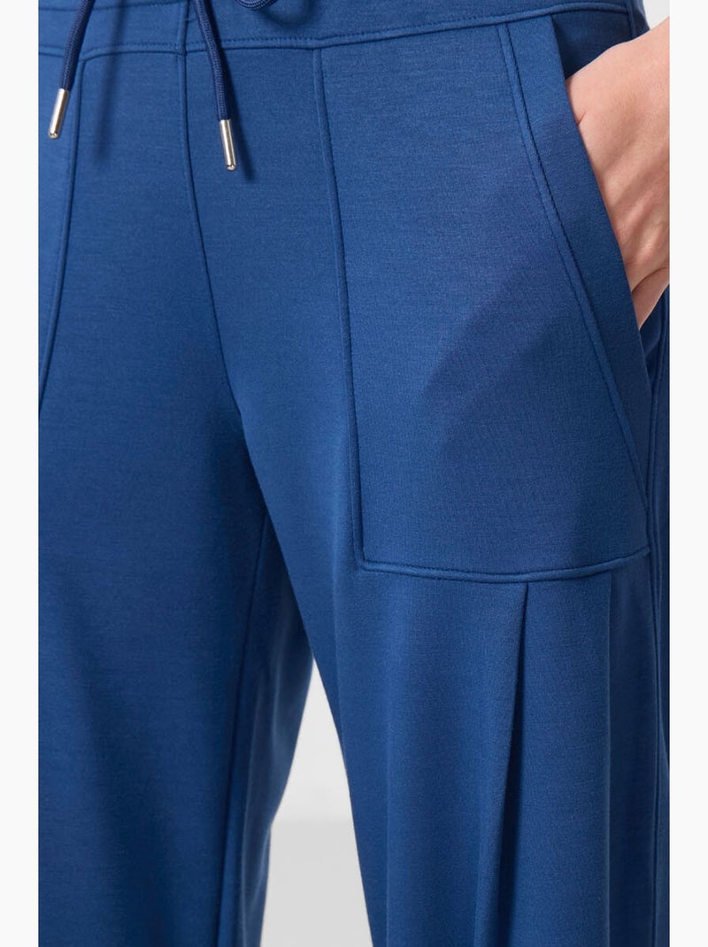 Relaxte broek van crêpe met middelhoge taille en zak tommy Blauw - Kiabi