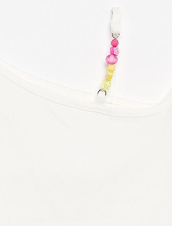 Ribtop met asymmetrische hals
