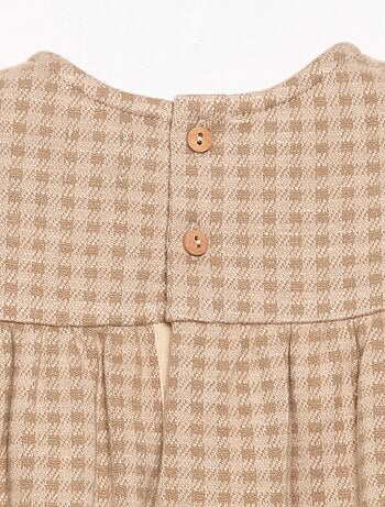 Robe à carreaux et manches longues