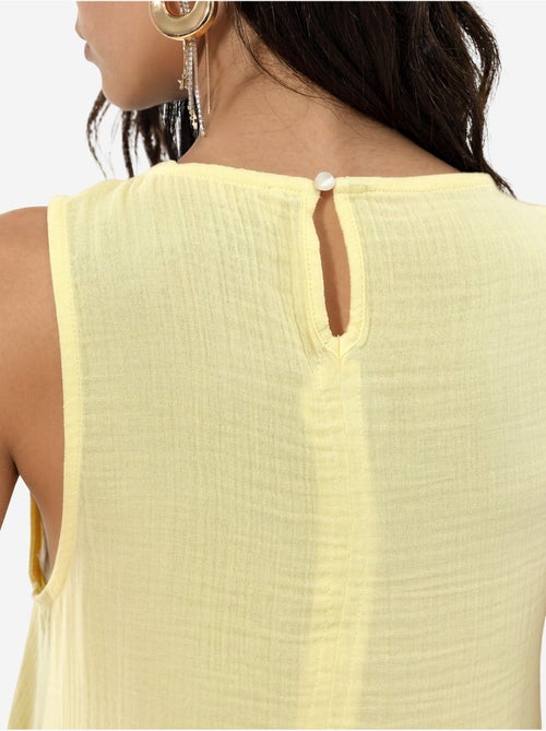 Robe de plage mi-longue en coton texturé avec fente hiccup - Kiabi Robe de plage mi-longue en coton texturé avec fente hiccup - Kiabi