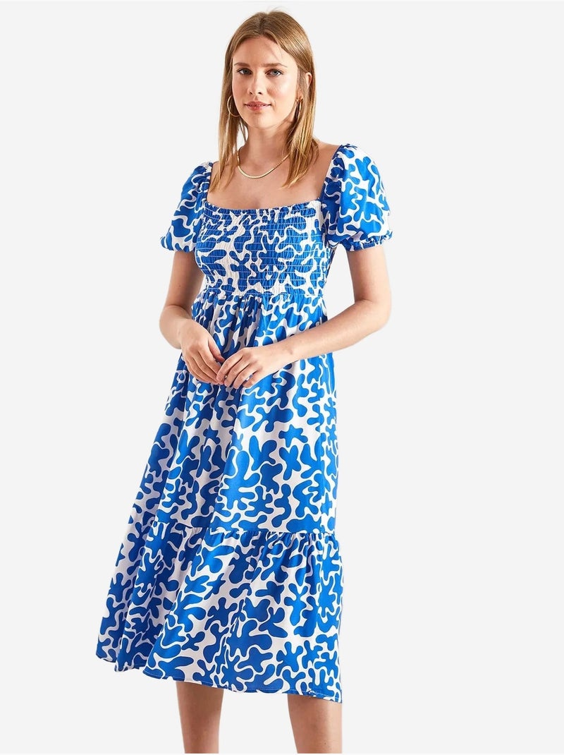 Robe évasée à motifs avec taille smockée lucci Bleu clair - Kiabi