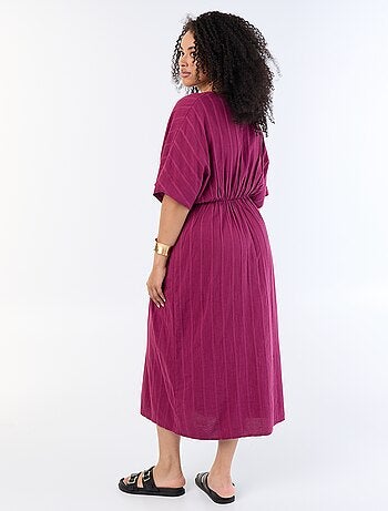 Robe longue col croisé avec bijou fantaisie