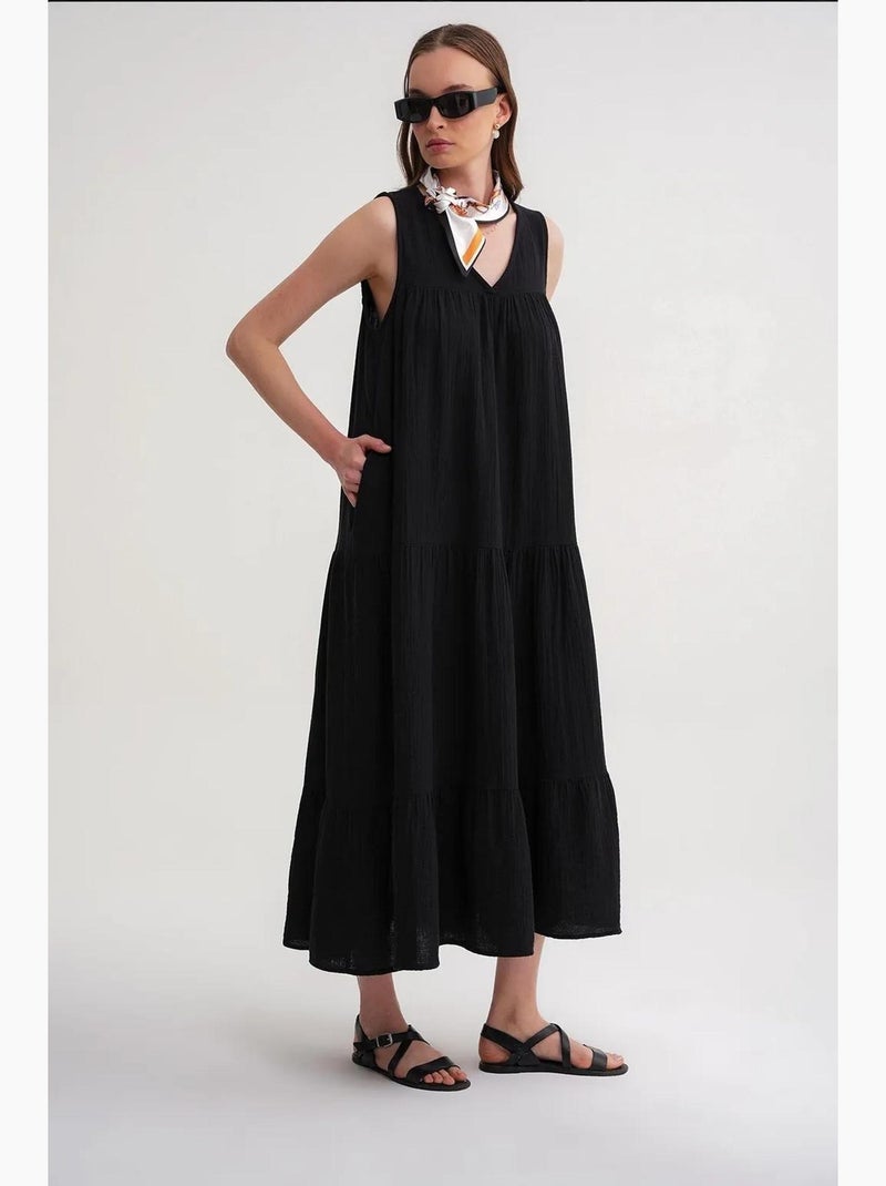 Robe mi-longue en mousseline sans manches à col en v et poches mixray Noir - Kiabi