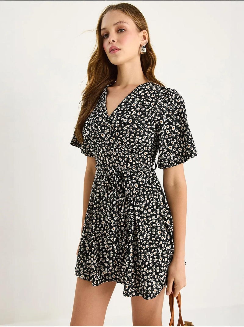 Robe mi-longue fleurie à col en v et fente lucci Noir - Kiabi