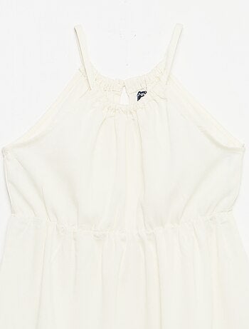 Robe unie à bretelles et volants