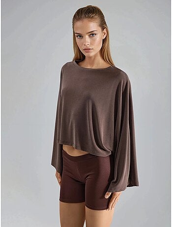 Ruimvallende blouse met boothals busem