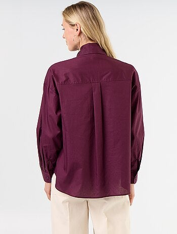 Ruimvallende blouse met lange mouwen en lavallièrekraag