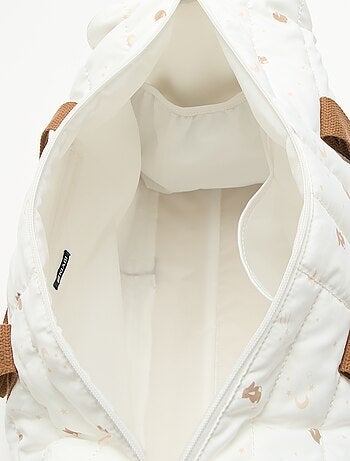 Sac à langer avec tapis à langer à l'intérieur et attache poussette.