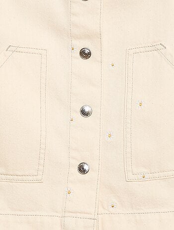 Salopette short avec fleurs brodées