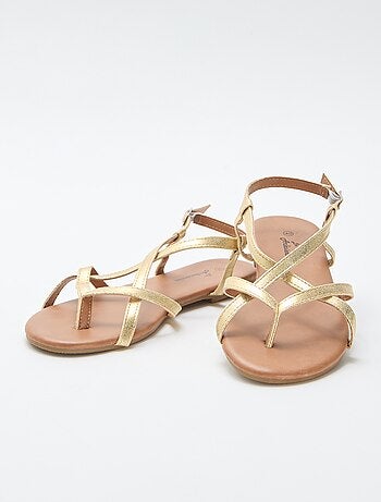 Sandales plates avec bride croisée entredoigt