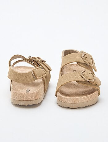 Sandales plates avec bride de maintien à la cheville ajustable par un scratch