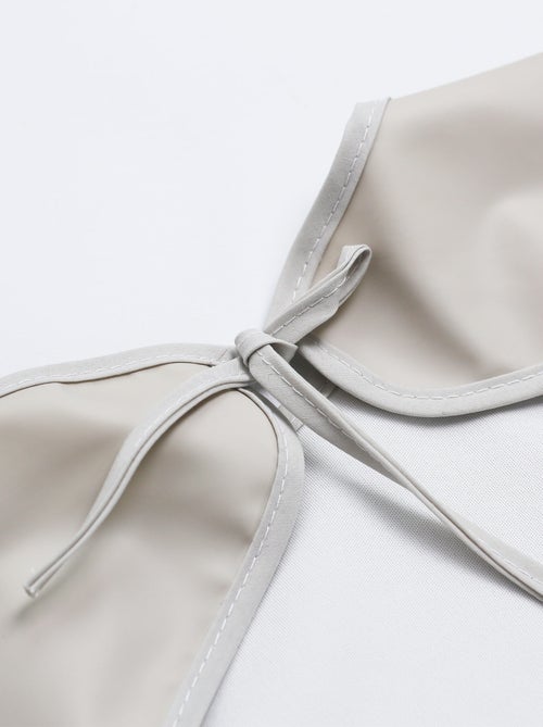 Schortslabbetje voor baby's - Kiabi Schortslabbetje voor baby's - Kiabi