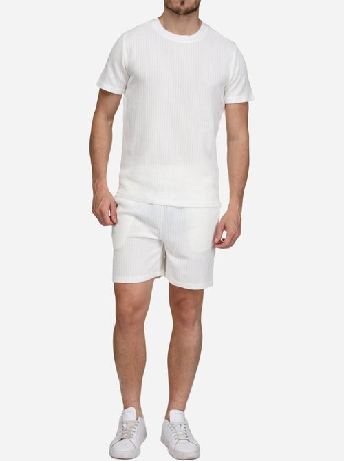 Set bestaande uit een effen T-shirt en een effen of bedrukte korte broek - Frilivin - Kiabi Set bestaande uit een effen T-shirt en een effen of bedrukte korte broek - Frilivin - Kiabi