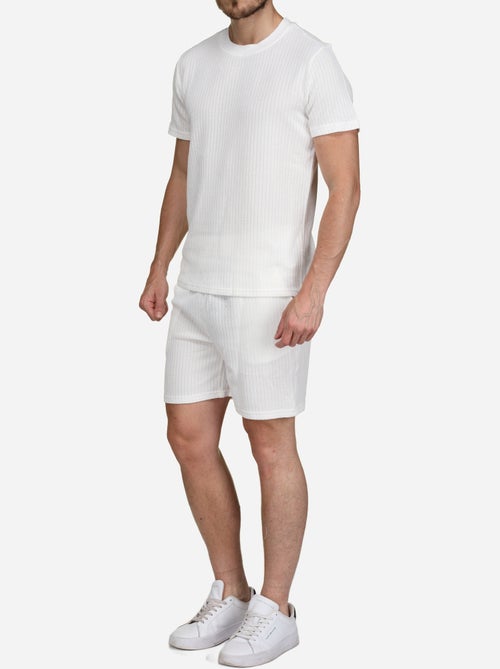 Set bestaande uit een effen T-shirt en een effen of bedrukte korte broek - Frilivin - Kiabi Set bestaande uit een effen T-shirt en een effen of bedrukte korte broek - Frilivin - Kiabi
