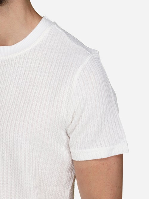 Set bestaande uit een effen T-shirt en een effen of bedrukte korte broek - Frilivin - Kiabi Set bestaande uit een effen T-shirt en een effen of bedrukte korte broek - Frilivin - Kiabi