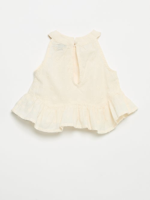Set met mouwloze blouse en short - Kiabi Set met mouwloze blouse en short - Kiabi