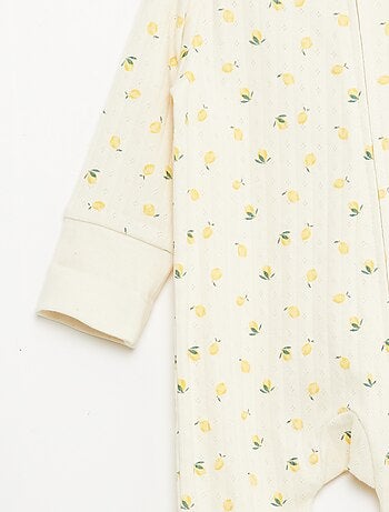 Set rekbare meegroei-body + pyjama van ribtricot
