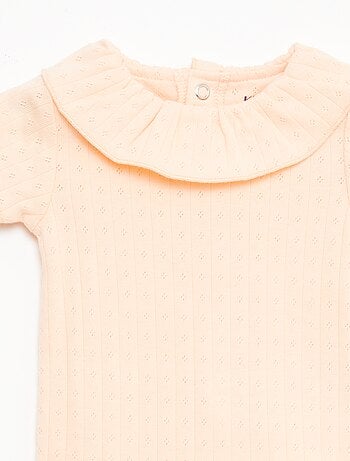 Set rekbare meegroei-body + pyjama van ribtricot