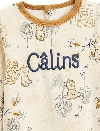 Set van 2 babypyjama's van velours met sterrenbeeldmotief.