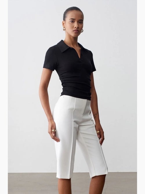 Short capri droit taille haute avec fente dilvin - Kiabi Short capri droit taille haute avec fente dilvin - Kiabi