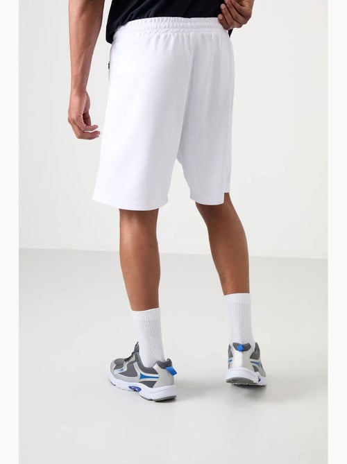 Short de jogging uni maille tommy - Kiabi Short de jogging uni maille tommy - Kiabi