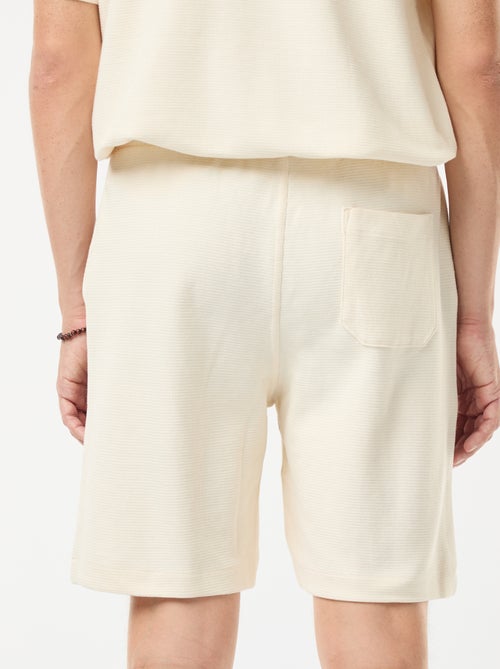 Short de sport avec poches en maille fantaisie - Kiabi