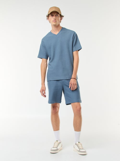 Short de sport avec poches en maille fantaisie - Kiabi