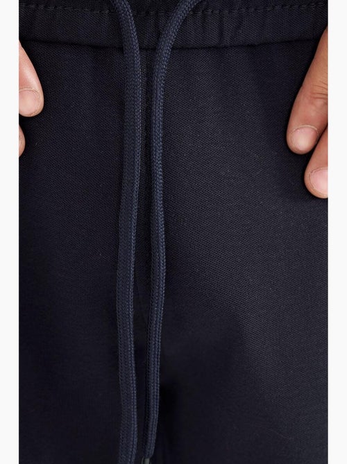 Short de survêtement homme à enfiler tommy - Kiabi Short de survêtement homme à enfiler tommy - Kiabi