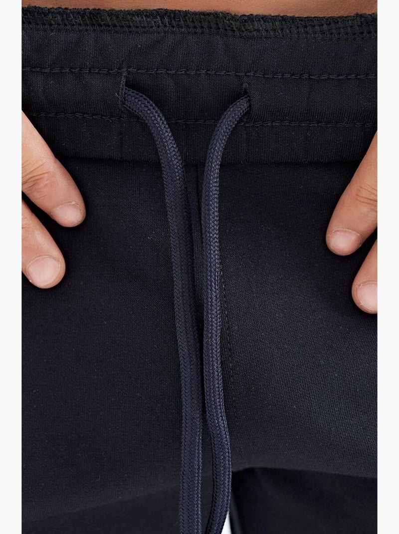 Short de survêtement homme en maille, uni tommy Bleu lagon - Kiabi