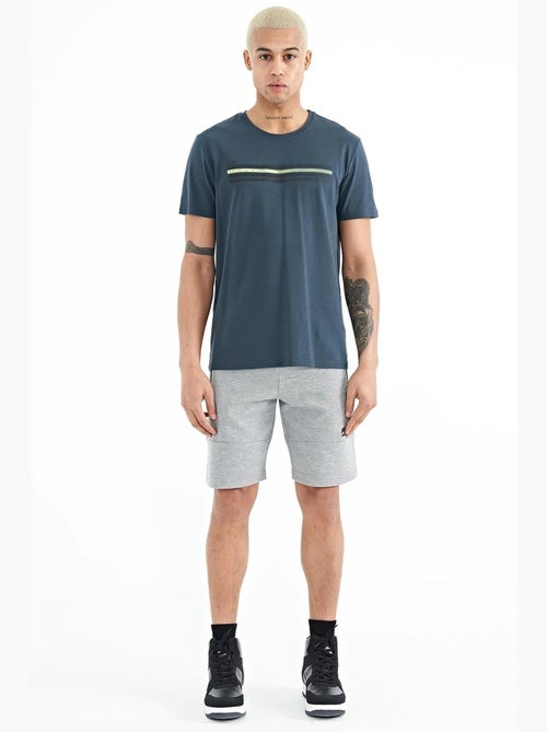 Short de survêtement homme en maille, uni tommy - Kiabi Short de survêtement homme en maille, uni tommy - Kiabi
