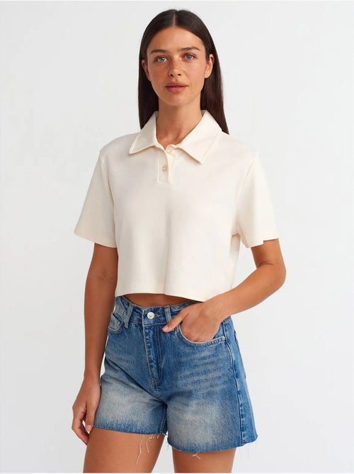 Short en denim taille haute à bouton dilvin - Kiabi Short en denim taille haute à bouton dilvin - Kiabi