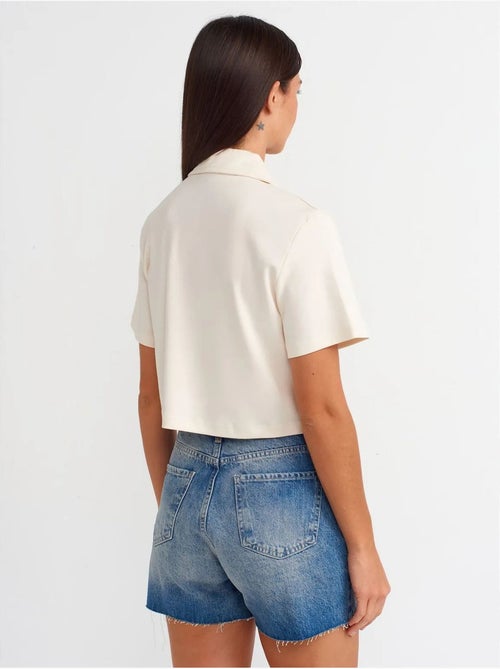 Short en denim taille haute à bouton dilvin - Kiabi Short en denim taille haute à bouton dilvin - Kiabi