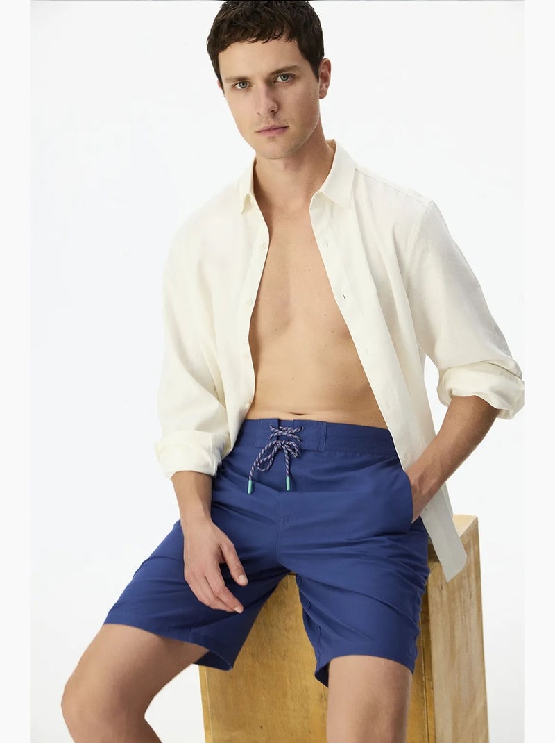 Short homme surfer à imprimé slogan penti Bleu marine - Kiabi