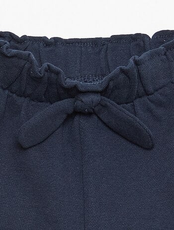 Short met ruches en strik in de taille