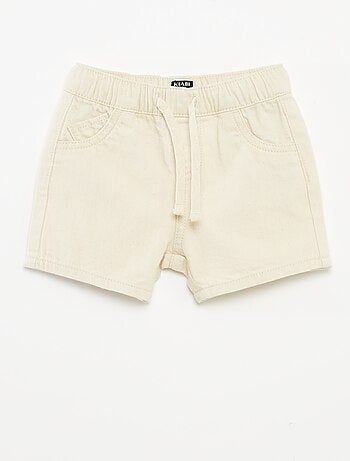 Short uni avec cordons de serrage