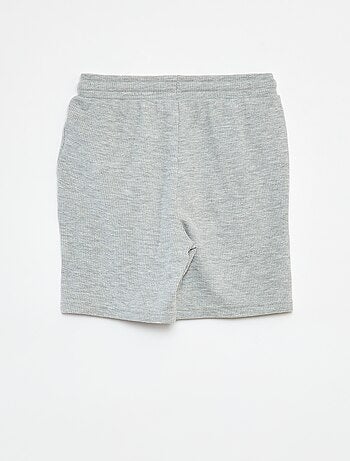 Short uni en maille gaufrée