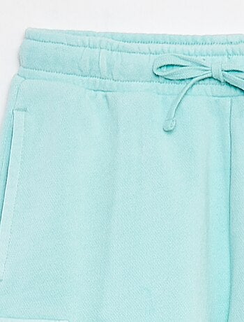 Short van dunne joggingstof met klepzakje