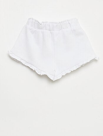 Short volanté avec nœud à la taille