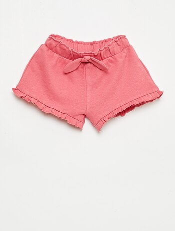 Short volanté avec nœud à la taille