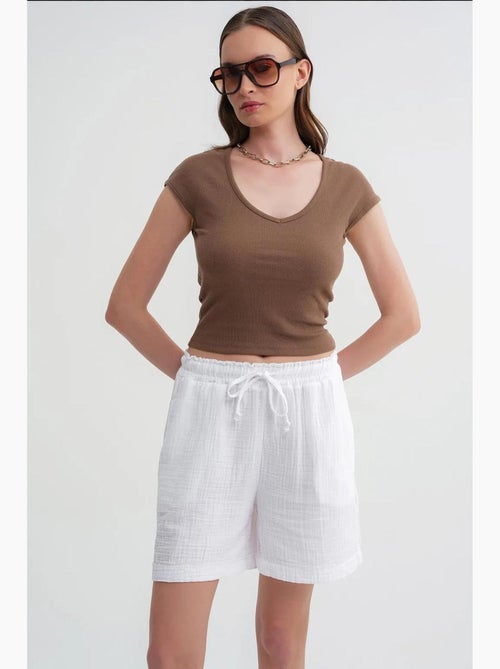 Shorts texturés à taille haute et jambe large mixray - Kiabi Shorts texturés à taille haute et jambe large mixray - Kiabi