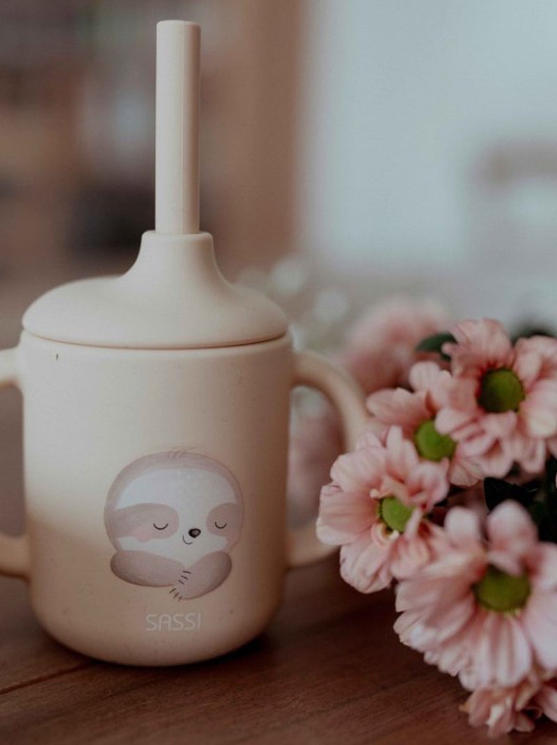 Siliconen beker met handvatten en rietje - dieren Beige - Kiabi