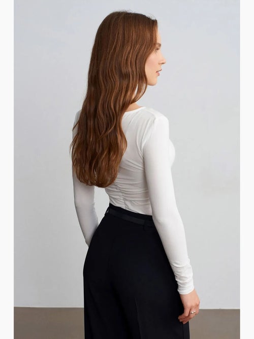 Slim fit blouse met boothals en lange mouwen dilvin - Kiabi Slim fit blouse met boothals en lange mouwen dilvin - Kiabi