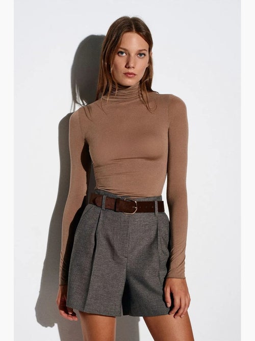 Slim fit jersey blouse met col dilvin - Kiabi Slim fit jersey blouse met col dilvin - Kiabi