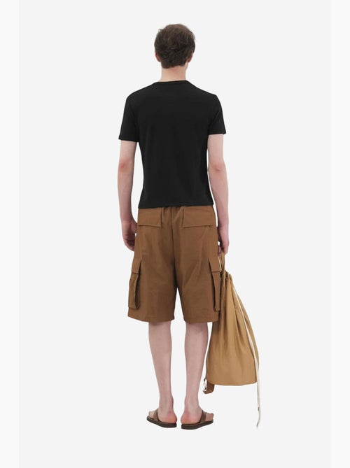 Slim fit t-shirt met ronde hals en knopen giesto - Kiabi Slim fit t-shirt met ronde hals en knopen giesto - Kiabi